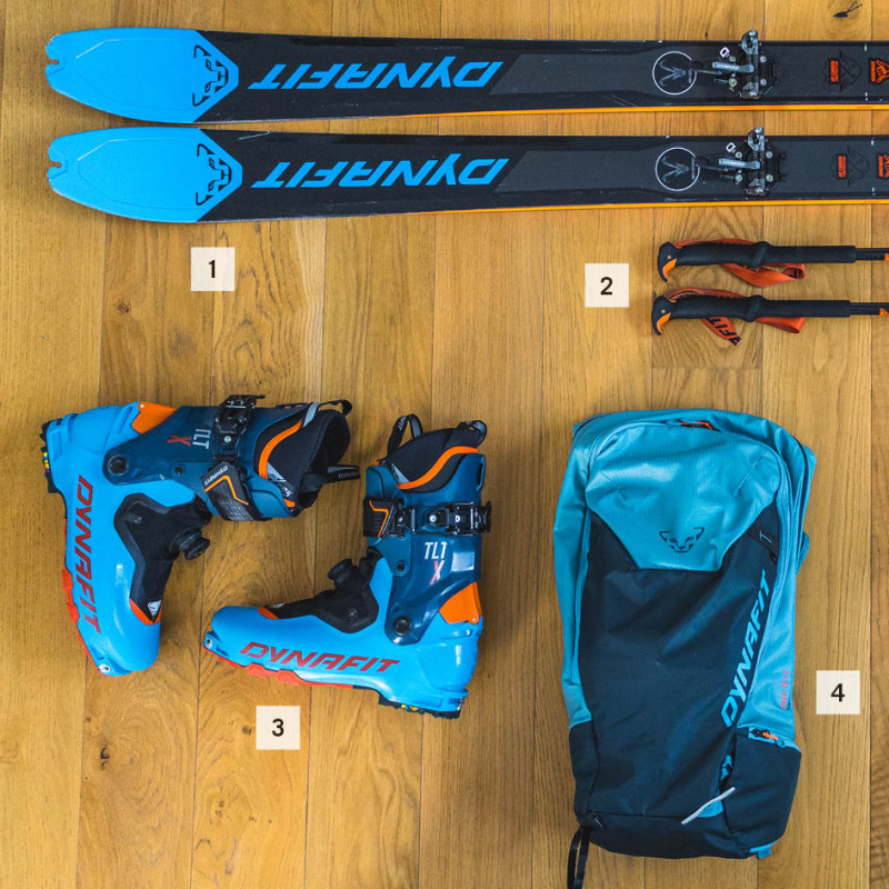 Top: Skis and ski poles below them; bottom from left to right: boots, backpack, ski crampons, GPS watch, skins.